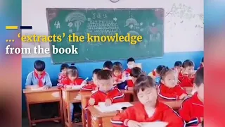 student in China tries to '''absorb,, knowledge from books using hands 😅😆funny video 😅😆