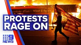 Minneapolis protests escalate after officer charged | Nine News Australia