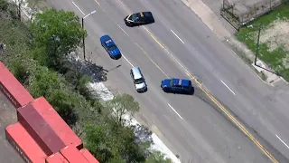 Wild police chase through Detroit: Police shoot at driver after he crashes into cops