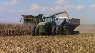 Big John Deere Machines Harvesting Corn