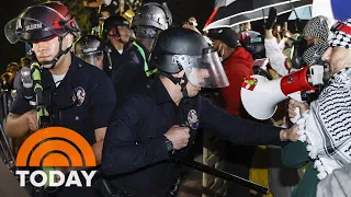 Police clash with UCLA protesters as officers storm encampment