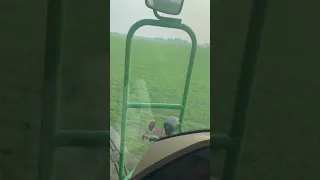 John Deere 4830 spraying wheat