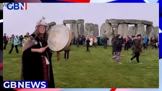 Record crowds gathered at the Stonehenge in Wiltshire to celebrate the winter solstice