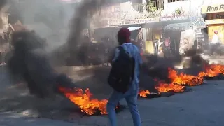 Residents of Port au Prince fear violence could spread after a gang attacked a community for four da