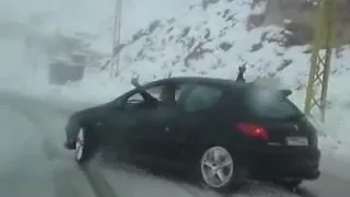 Peugeot 206 S16 drifting on snow