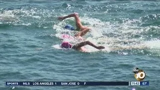 14-year-olds to swim 21 miles and set world record