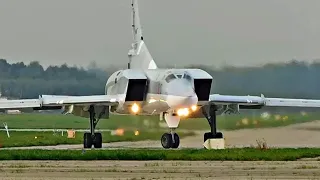 Tu-22M3 Powerful takeoff at dusk with fiery afterburner. Backfire.