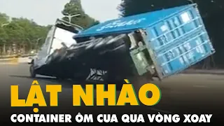 Camera ghi hình xe container lật nhào khi ôm cua qua vòng xoay