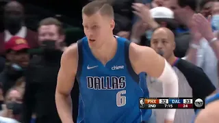 Porzingis gets the block on McGee then throws down the alley oop slam