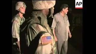 US troops and Iraqi police on joint night patrols