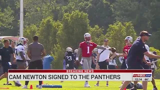 Carolina Panthers sign Cam Newton to return as quarterback