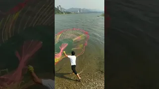 xixili archery bow fishing reel, Net fishing in stream by boy and girl Caught fish in River 3