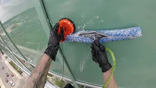 Rope access window cleaning in Canada includes rigging and entire drop.