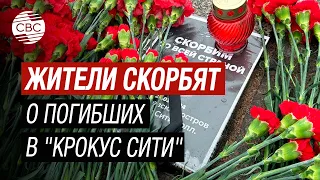 В Санкт-Петербурге жители приносят цветы в память погибших в Крокус Сити Холле