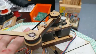 Improved wooden mechanism for the sand drawing robot