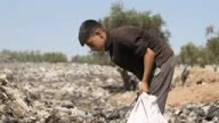 Poverty forces Syria's children to dig through trash
