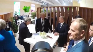 Видео первого рукопожатия Трампа и Путина