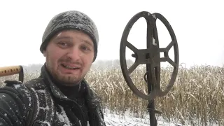 A pile of coins on the snowy fields of Ukraine