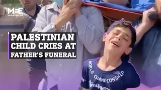 "Goodbye, father” Palestinian child cries at the funeral of his father and brother in the Gaza Strip