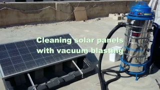 Cleaning solar panels with vacuum blasting