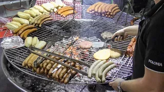 Huge Circular Grill from Poland. Burger, Skewers, Sausages, Hot Dogs. Street Food Seen in Italy