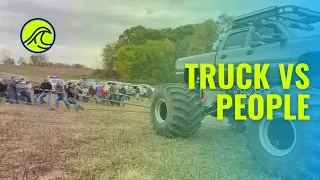 Monster Truck vs people vs 7 Trucks . TUG OF WAR !