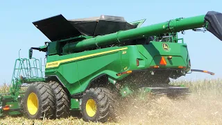 John Deere X9 1100 harvesting corn with 16 row C16F Corn Header