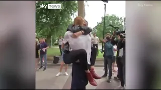 Team Gb swimmers are greeted by their family as they arrive home