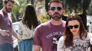 Ben Affleck puffs on a cigarette as he and ex wife Jennifer Garner appear to have a tense discussion