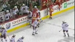 Olli Jokinen crosschecks Wojciech Wolski