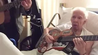 Guitarist George Cole jams with his old guitar teacher in hospital.