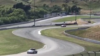 Porsche 911 RSR 3.0 and Ferrari 512 BB LM  on at Sonoma racetrack.