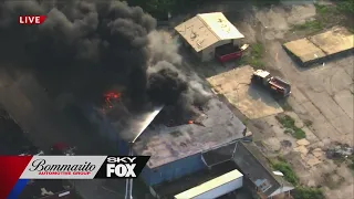 Black smoke visible for miles following East St. Louis warehouse fire