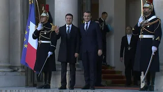 Merkel and Zelensky arrive at Elysee Palace for landmark Paris summit on Ukraine | AFP