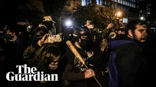 Police and protesters scuffle in Washington DC's Black Lives Matter Plaza