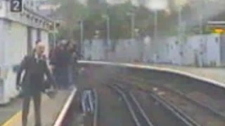 Soldier rescues injured woman from train tracks