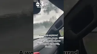 Woman dodges trees driving through apparent tornado in Destin, Florida