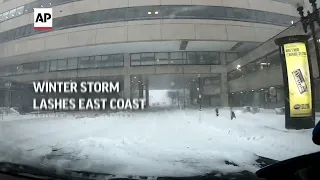 Winter storm lashes East Coast with deep snow