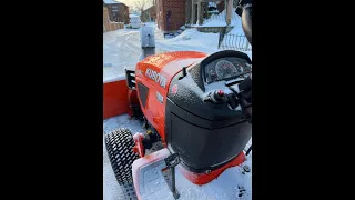 The snow gods giveth and the Kubota BX2816 snowblower blow'eth away