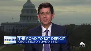 The deficit would still be wide even if rates went down, says CBO Director Phillip Swagel