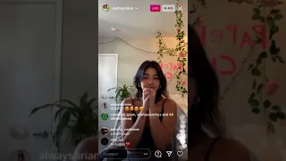 Audrey Mika singing “positions” on Instagram Live