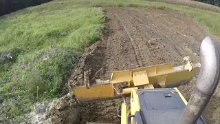 Grading The Mud From The Minnow Pond