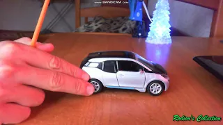 Модель від Kinsmart BMW I 3  у масштабі 1/32.