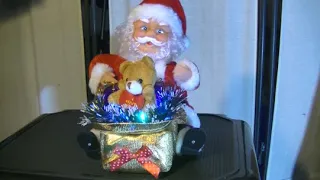 Santa Claus with a teddy bear