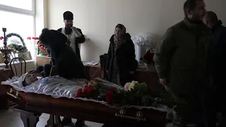 Mother's anguish as volunteer medic buried in Ukraine