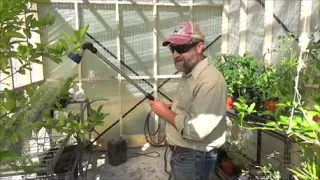 homemade greenhouse with ROLL UP sides