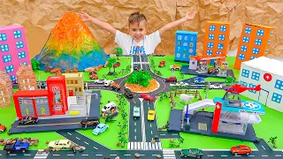 วลาดและนิกิเล่นกับรถของเล่นและสร้างเมือง Matchbox
