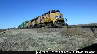 3 UP Locomotives with shipping container, cars & stops in Elkhart, Iowa