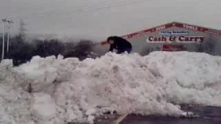 Richard yet again jumping on a snow mountain in tesco carpark!!!