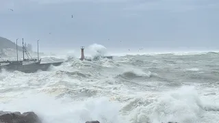 God is Coming. Kalk Bay, Cape Town South Africa, taking a Hammering today.